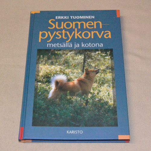 Erkki Tuominen Suomenpystykorva metsällä ja kotona